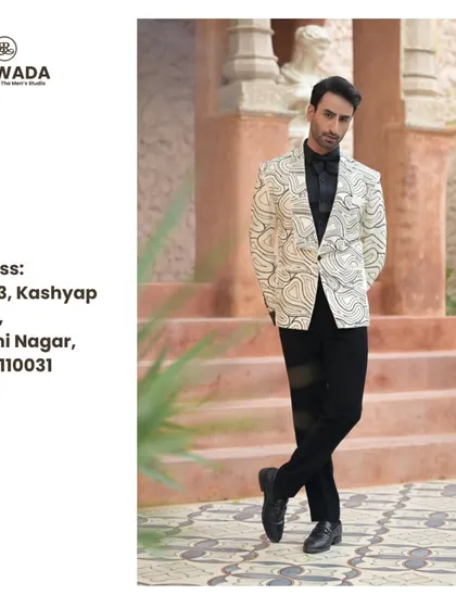 A full-length view of the abstract line-work tuxedo, showcasing its modern fit and artistic design.