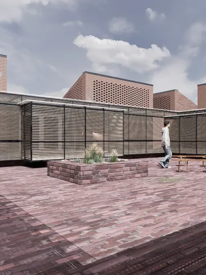 Another view of the Studio Tarai terrace, showing how the brick volumes are interwoven with lighter, screened structures. This layering of materials creates a dynamic environment that is both enclosed and open to the elements.