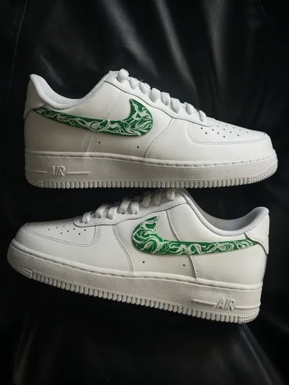 A pair shot of the green paisley custom sneakers.