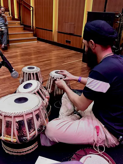 Carefully tuning my tablas during soundcheck. Each drum has to be perfectly tuned to the tonic note of the performance.