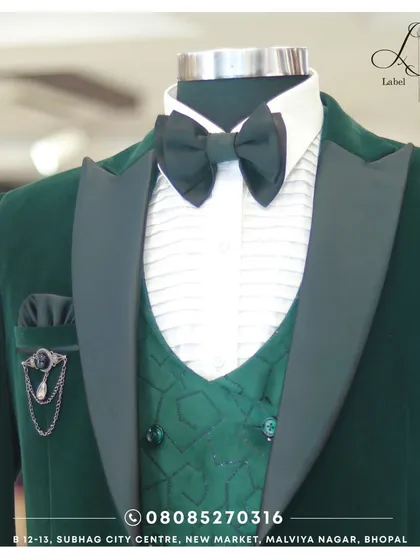 In the lush embrace of green, I celebrate the fusion of cultures. This green velvet tuxedo is a perfect example of tradition with a modern twist.
