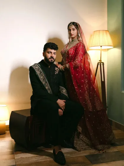 This is elegance crafted with light and shadow. For Sana and Naveed’s Nikah, we created this regal portrait that feels both timeless and powerful. It showcases how styled indoor sessions can produce fine art photography, highlighting the grace of traditional attire and the deep connection between a couple.