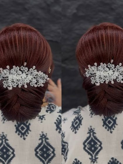 A close-up of a clean, braided fishtail bun, perfect for a sophisticated look.