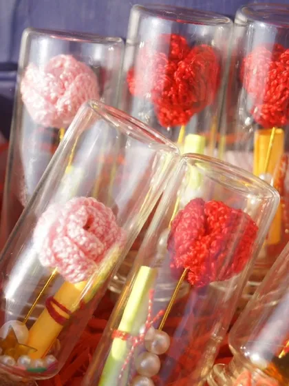 A collection of my 'message in a bottle' gifts, filled with tiny crochet roses and hearts. These are perfect for bulk gifting or as unique party favors.