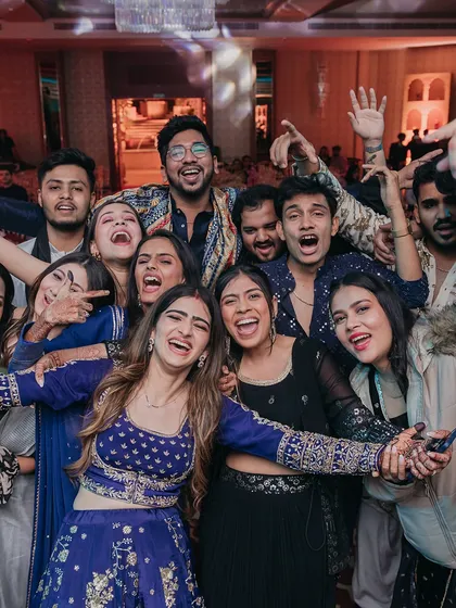 A candid shot of the bride and her friends enjoying the Sufi night. My goal is to create an environment where everyone feels free to let loose and celebrate.
