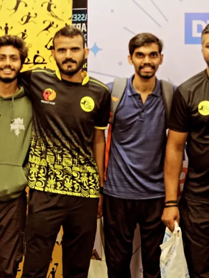 Our coaching team posing for a photo at a community event. We work together to plan and execute every event with professionalism and high energy.