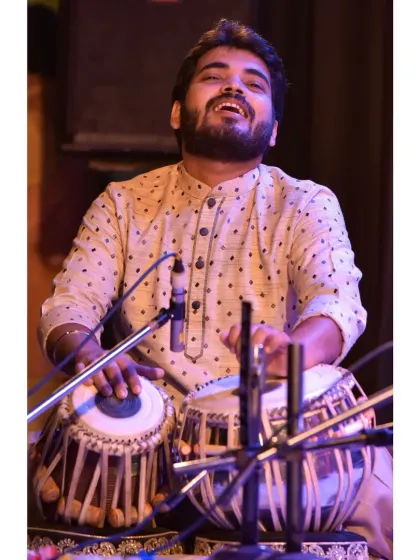 The joy of playing is a feeling like no other. This photo captures a moment of pure happiness during a performance.