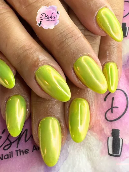 Electrifying and fierce. These neon green chrome nails are serving pure glow goals and are sure to make a statement.