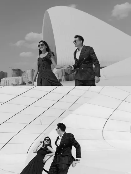 A black and white collage from the Heydar Aliyev Centre in Baku. The graphic lines and contrast highlight the couple's stylish outfits and confident poses, creating a high-fashion feel.