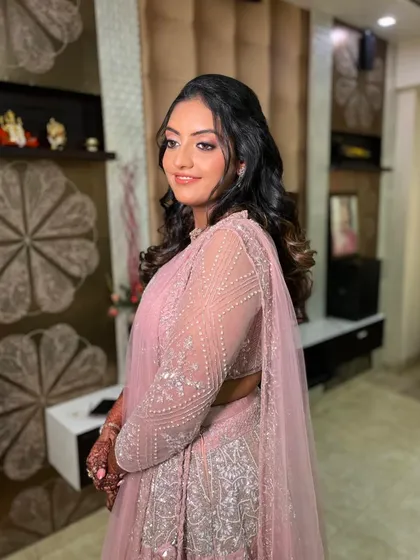 Another angle of this lovely pink-themed engagement look, showing how the makeup and hair come together perfectly.
