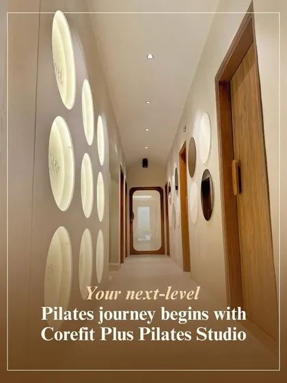 This hallway, with its calming decor and soft lighting, leads you toward our practice rooms. It represents the start of your next-level Pilates journey with us.