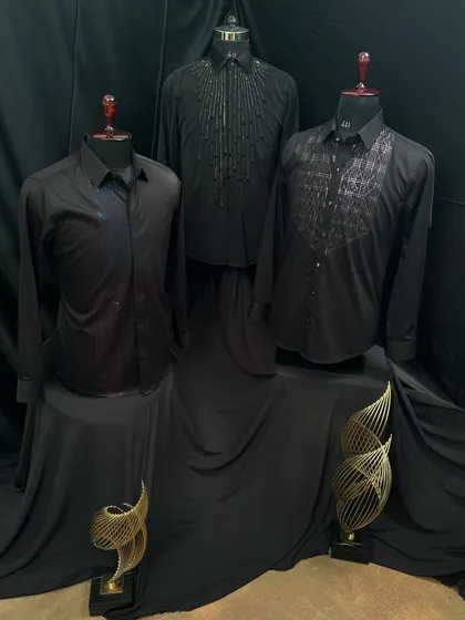 A collection of my exclusive black designer shirts. Each one is perfectly tailored and adorned with unique, striking details that redefine sophistication.