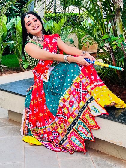 Ready for Garba night! This look features bold eyes and radiant skin, designed to stay put while you dance the night away. The colorful lehenga is the star of the show.