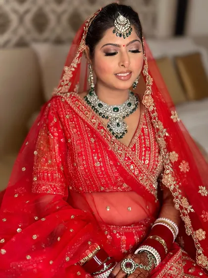 A moment of calm before the ceremony. This shot beautifully captures the soft shimmer on the eyes and the flawless finish of her #NOFILTERMAKEUP.
