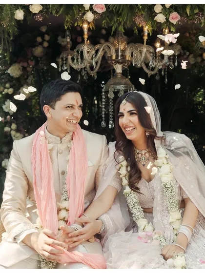 A shared laugh between the bride and groom during their garden wedding. It’s these moments of spontaneous joy that I strive to capture, showing the easy, happy connection between the couple.