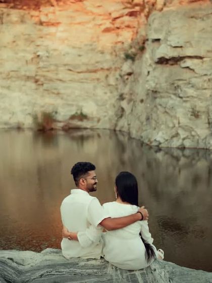 A quiet moment of togetherness as a couple looks out over the water at a scenic quarry. These landscape portraits are perfect for capturing a sense of shared adventure.