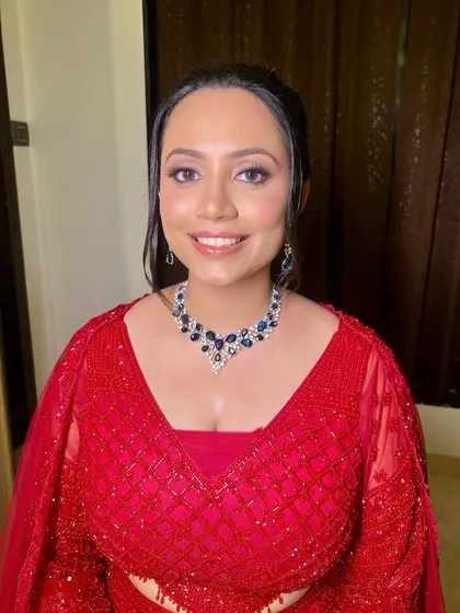 A close-up of Archana's elegant and fresh sangeet look, perfect for her big night.