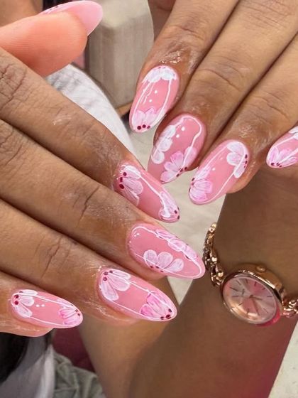 A lovely pink set covered in delicate, hand-painted cherry blossoms. The white flowers with tiny maroon centers create a beautiful all-over pattern.