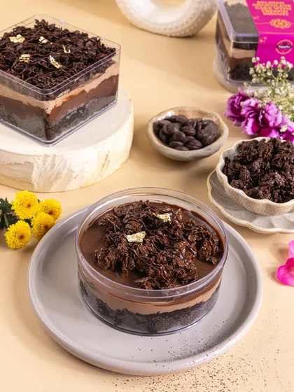 This layered chocolate tub dessert is all about texture. I styled it with its ingredients like chocolate chips and crumble to give customers a hint of what's inside.