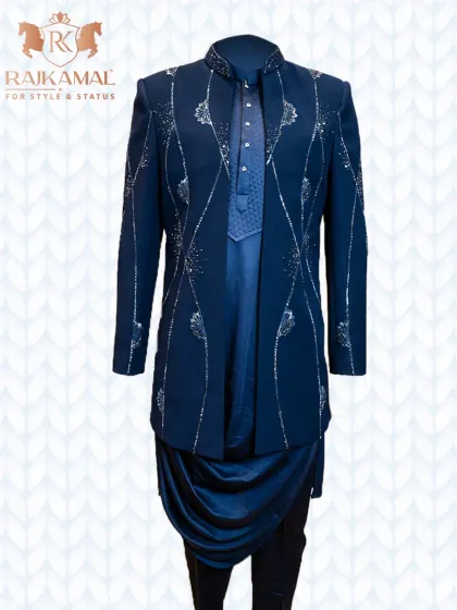 My open Indo-Western jacket paired with a cowl kurta. This navy blue ensemble features delicate silver beadwork, offering a look that is both royal and fashion-forward.