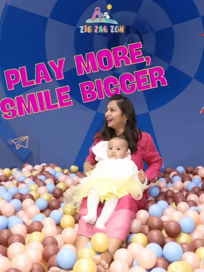 Play more, smile bigger! A mother and her baby share a beautiful moment in our colorful ball pit, showing that our play area is fun for all ages.
