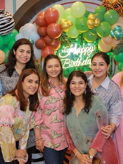 A group of moms enjoying the party. We provide a comfortable and stylish space for parents to relax, chat, and enjoy the celebration while we take care of the kids.