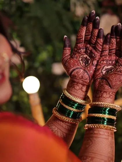 A happy client showing off the dark, beautiful stain of her mehndi. My 100% natural henna guarantees this rich color.