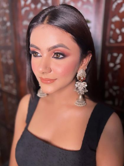 A soft yet sultry smokey eye look. I used warm brown and black tones to create this look, pairing it with nude lips and beautiful silver jhumkas for a bohemian-chic vibe.