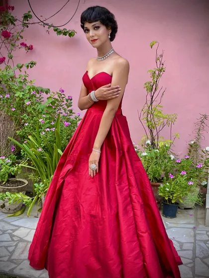 For a truly glamorous event, nothing beats a classic red ball gown. I crafted this piece with a sweetheart neckline and a full, flowing skirt that makes a grand entrance. It’s the kind of custom western gown that ensures you are the center of attention.
