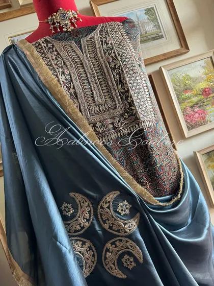 A slightly different angle of the styled ensemble, showcasing the sheen of the Italian silk organza and the depth of the embroidery.