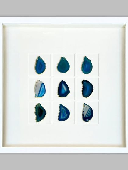 The 'Sapphire' version of the framed agate stones. The cool blue tones offer a calming, serene aesthetic, perfect for a modern living space or office.