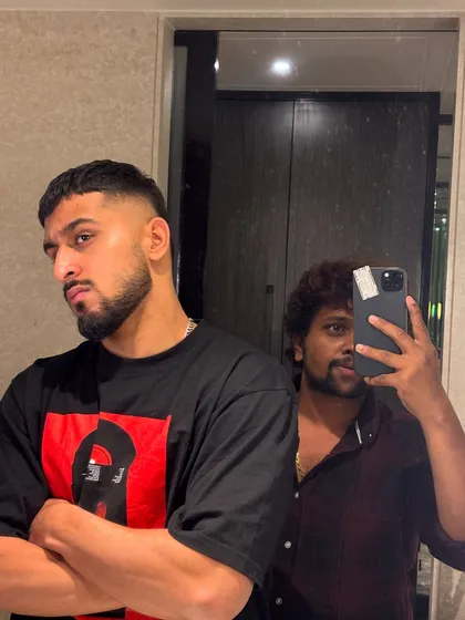 A sharp, modern crop fade for Umran Malik. This style is all about precision and clean lines, a popular choice among many of my clients for a confident, stylish look.