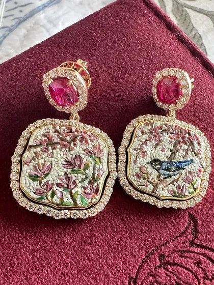 A detailed shot of the Cherry Blossom earrings, showing the texture and colour variation achieved through the micromosaic technique.
