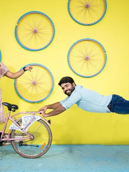 Who says you can't fly? A playful and creative shot using forced perspective to create a fun, memorable image that shows the couple's lighthearted connection.