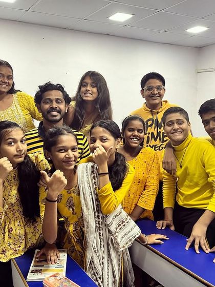 Navratri Day 5, 2023: Yellow. A bright and cheerful group photo with students.
