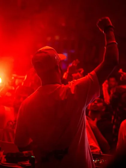 A powerful silhouette of me with my fist in the air, against a backdrop of red light.