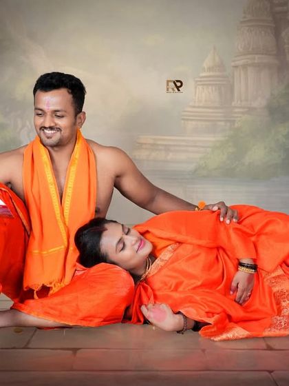 Another beautiful scene from our Seetha-Ram series. The husband reads from a book while his wife rests peacefully, set against a backdrop of ancient temples.