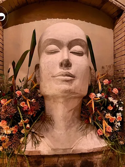 An artistic floral installation at a citrus-themed baby shower held at One8 Commune. This shows how I can integrate event decor with a venue's existing aesthetic to create something truly unique.