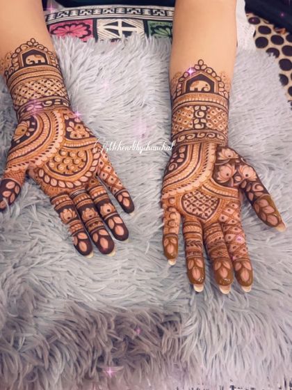 A duplicate of image 97, showcasing the lovely elephant-themed engagement mehendi.