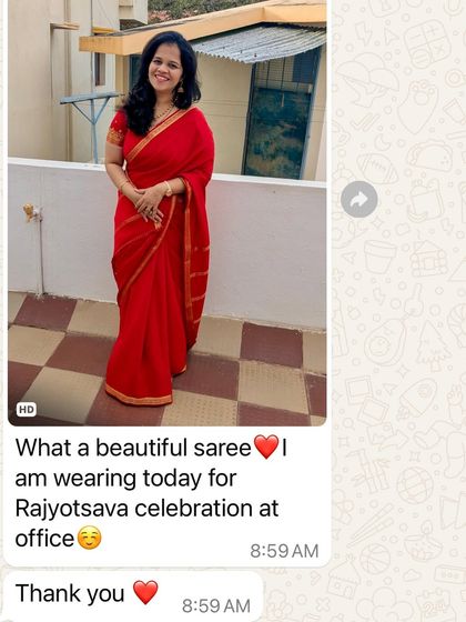 "What a beautiful saree." A happy client celebrating Rajyotsava at her office in one of my classic red sarees.