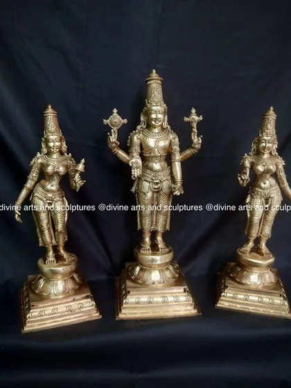 This set features Lord Vishnu accompanied by his consorts, Sridevi and Bhudevi. Sridevi represents wealth and spiritual knowledge, while Bhudevi is the embodiment of Mother Earth's fertility. Cast in gleaming bronze, this trio represents the divine balance of preservation, prosperity, and life.