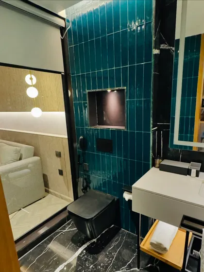 Another view of a modern hotel bathroom, showing the layout and high-quality fixtures we look for when selecting accommodation partners.
