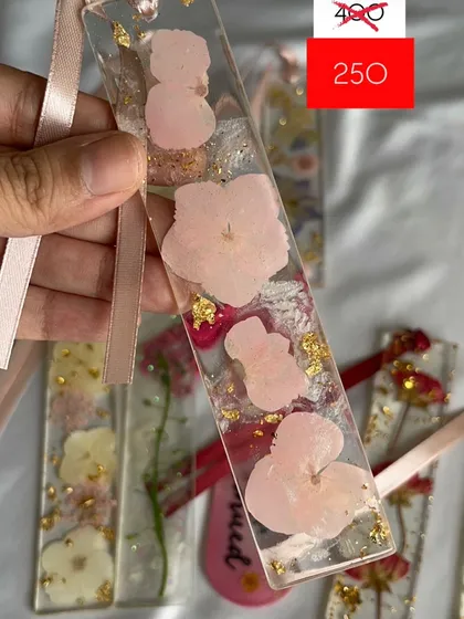 A delicate pink floral mini bookmark, perfect for your softest reads. Only one is available as part of my moving out sale.