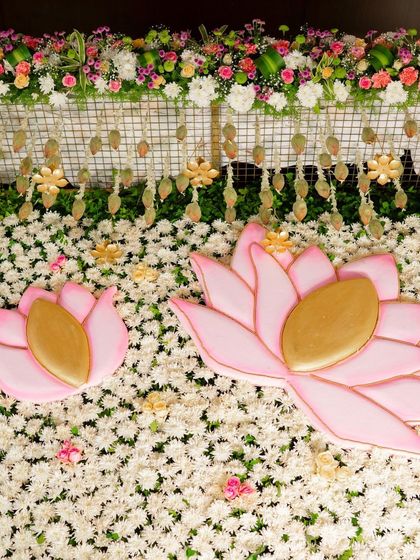 Another look at the intricate floral wall, where each flower is placed to create a rich, textured backdrop for the naming ceremony.