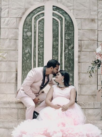 A tender maternity moment on the steps of our grand, European-style staircase.