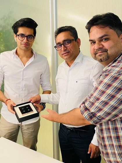 Our team presenting the framed WiFi Keypad to Architect Samridh Aneja. We value our partnerships with forward-thinking designers.