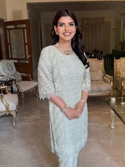 Ananya's full look, showcasing how soft, natural makeup can be incredibly elegant and polished for any daytime event.