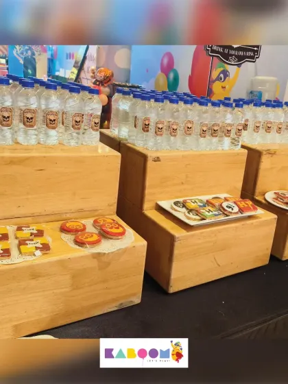 Even the refreshments get a magical touch. We provide themed snacks and drinks, like these custom-labeled "potion" water bottles, to keep the story going throughout the party.