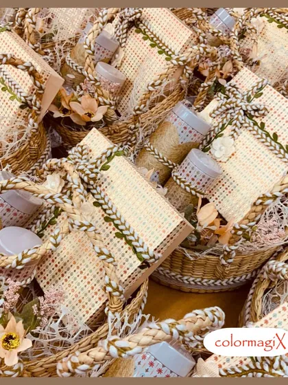 A large collection of our eco-chic wedding favors, featuring woven baskets and cane-wrapped boxes, perfect for a rustic or sustainable wedding theme.