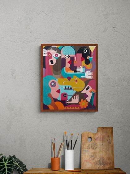 The 'Empowered She' painting shown in a mockup over a creative desk space. It's a piece that inspires freedom and creativity.